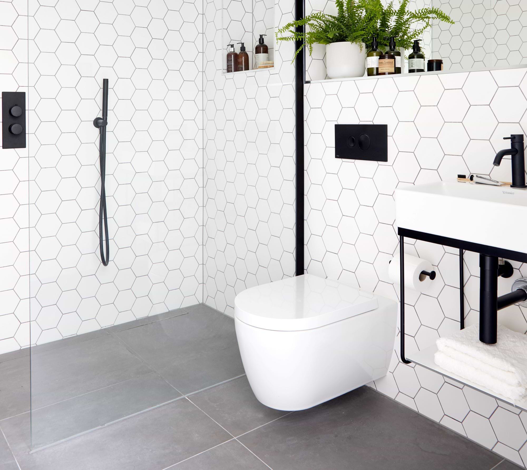 Opt For A Wall-Mounted Toilet